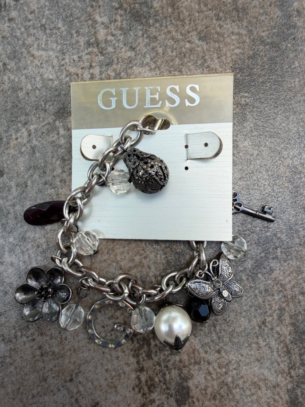 GUESS Silver-Tone Charm Bracelet with Black, Clear and Pearl Accents